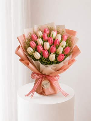 Blush Ivory Tulips with fresh pink and white tulips in elegant blush wrapping Blush Ivory Tulips with fresh pink and white tulips in elegant blush wrapping