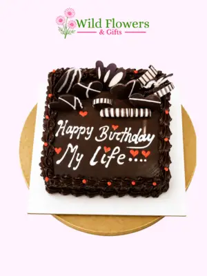 Romantic chocolate birthday cake with chocolate toppings and Happy Birthday message Romantic chocolate birthday cake with chocolate toppings and Happy Birthday message