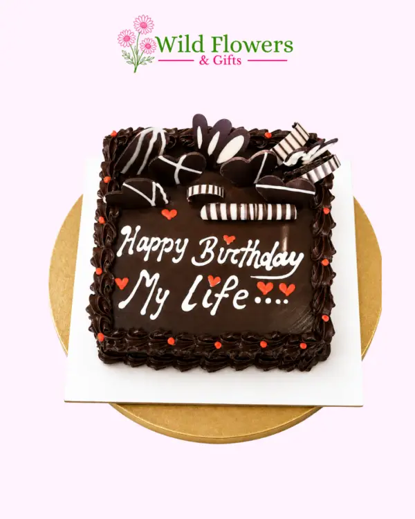 Romantic chocolate birthday cake with chocolate toppings and Happy Birthday message Romantic chocolate birthday cake with chocolate toppings and Happy Birthday message
