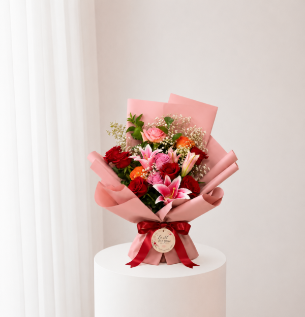 Ruby Lily Bouquet with pink lilies red roses and blush wrapping Ruby Lily Bouquet with pink lilies red roses and blush wrapping