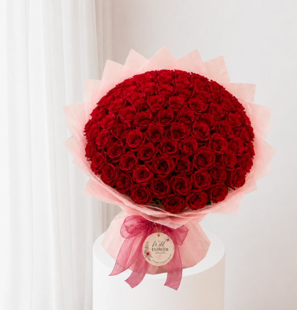 Luxury Red Rose Bouquet with fresh red roses, soft pink wrapping and ribbon for flower delivery in Dubai Luxury Red Rose Bouquet with fresh red roses, soft pink wrapping and ribbon for flower delivery in Dubai