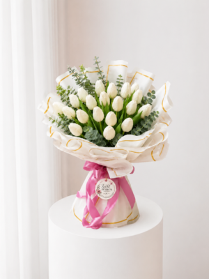 Ivory Tulip Bouquet with fresh white tulips greenery and elegant wrapping Ivory Tulip Bouquet with fresh white tulips greenery and elegant wrapping