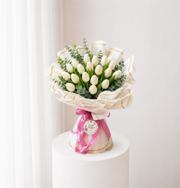 Ivory Tulip Bouquet with fresh white tulips greenery and elegant wrapping Ivory Tulip Bouquet with fresh white tulips greenery and elegant wrapping