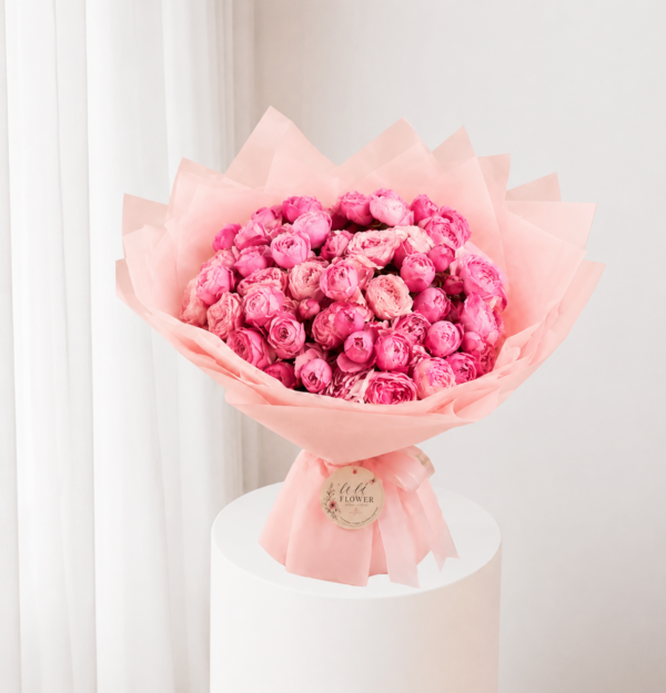 Fuchsia Peony Bouquet with fresh bright pink peonies and elegant pink wrapping