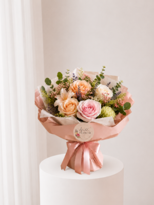 Peach Garden Bouquet with peach blush flowers and fresh greenery