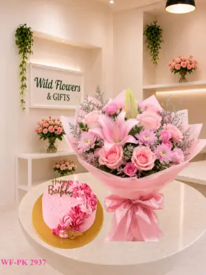 Pink Lily Cake Dubai with pink lilies roses and 500g customized birthday cake Pink Lily Cake Dubai with pink lilies roses and 500g customized birthday cake