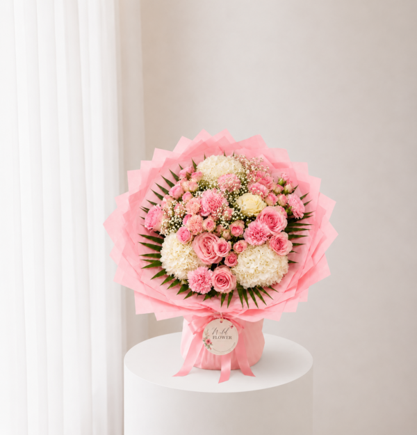 Pink Garden Bouquet with fresh pink roses cream flowers and elegant pink wrapping