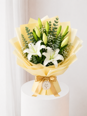 Ivory Lily Bouquet with fresh white lilies and cream wrapping Ivory Lily Bouquet with fresh white lilies and cream wrapping