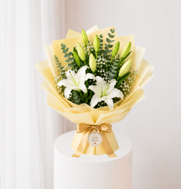 Ivory Lily Bouquet with fresh white lilies and cream wrapping Ivory Lily Bouquet with fresh white lilies and cream wrapping
