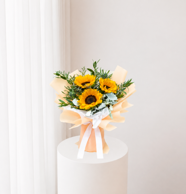 Radiant Sunflower Bouquet with fresh yellow sunflowers greenery and elegant cream wrapping