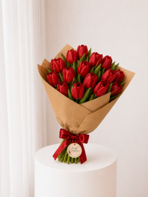 Ruby Tulip Bouquet with fresh red tulips kraft wrapping and red ribbon Ruby Tulip Bouquet with fresh red tulips kraft wrapping and red ribbon