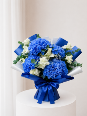 Blue Hydrangea Bouquet with white flowers greenery and blue wrapping Blue Hydrangea Bouquet with white flowers greenery and blue wrapping