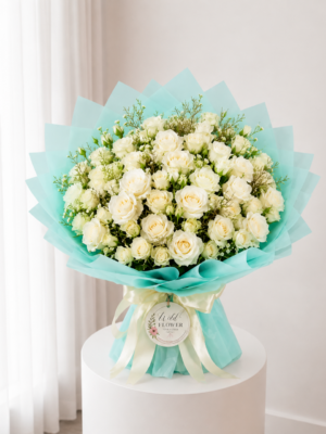 Mint Rose Bouquet with fresh white roses delicate flowers and mint wrapping Mint Rose Bouquet with fresh white roses delicate flowers and mint wrapping