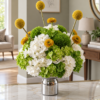 Hydrangea Centerpiece Dubai with white green flowers and yellow accents Hydrangea Centerpiece Dubai with white green flowers and yellow accents