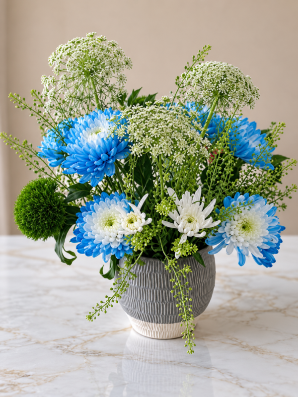 Blue Chrysanthemum Arrangement Dubai with blue white flowers and greenery Blue Chrysanthemum Arrangement Dubai with blue white flowers and greenery