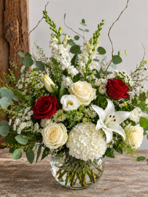 Rose Lily Arrangement Dubai with red roses white lilies hydrangea and eucalyptus Rose Lily Arrangement Dubai with red roses white lilies hydrangea and eucalyptus