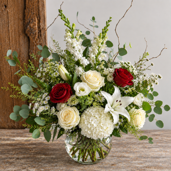Rose Lily Arrangement Dubai with red roses white lilies hydrangea and eucalyptus Rose Lily Arrangement Dubai with red roses white lilies hydrangea and eucalyptus