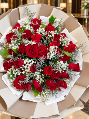Red Rose Bouquet Dubai with baby’s breath and elegant cream wrapping Red Rose Bouquet Dubai with baby’s breath and elegant cream wrapping
