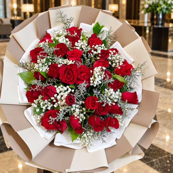 Red Rose Bouquet Dubai with baby’s breath and elegant cream wrapping Red Rose Bouquet Dubai with baby’s breath and elegant cream wrapping