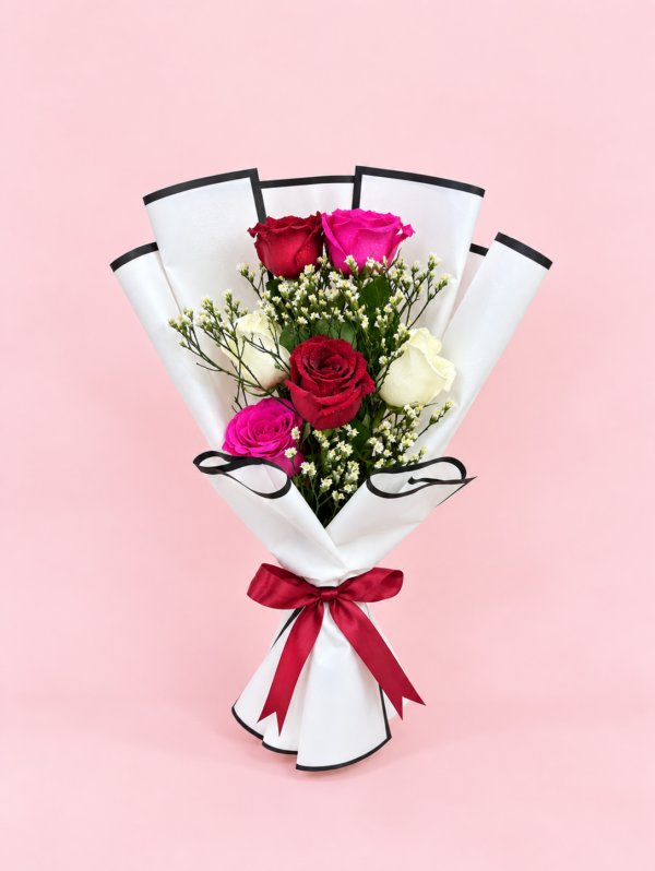 Mixed Rose Bouquet Dubai with red pink and white roses in elegant white wrapping Mixed Rose Bouquet Dubai with red pink and white roses in elegant white wrapping