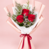 3 Red Roses Dubai bouquet with white fillers pink wrapping and red ribbon