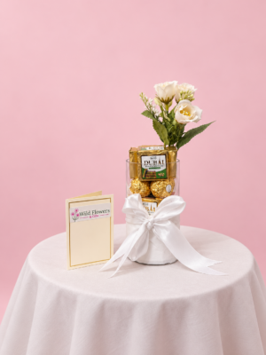 Kunafa Chocolate Gift Dubai with 8 Ferrero Rocher chocolates 12 Kunafa chocolates and white flowers Kunafa Chocolate Gift Dubai with 8 Ferrero Rocher chocolates 12 Kunafa chocolates and white flowers
