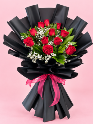 Black Wrapped Roses Dubai with fresh red roses baby’s breath and pink ribbon Black Wrapped Roses Dubai with fresh red roses baby’s breath and pink ribbon