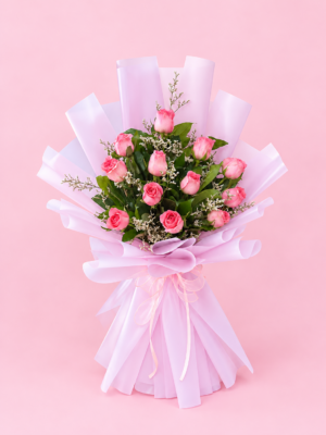 Pink Rose Gift Dubai with fresh pink roses greenery and soft pink wrapping Pink Rose Gift Dubai with fresh pink roses greenery and soft pink wrapping