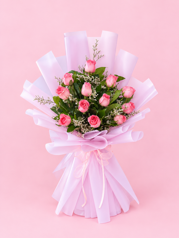 Pink Rose Gift Dubai with fresh pink roses greenery and soft pink wrapping